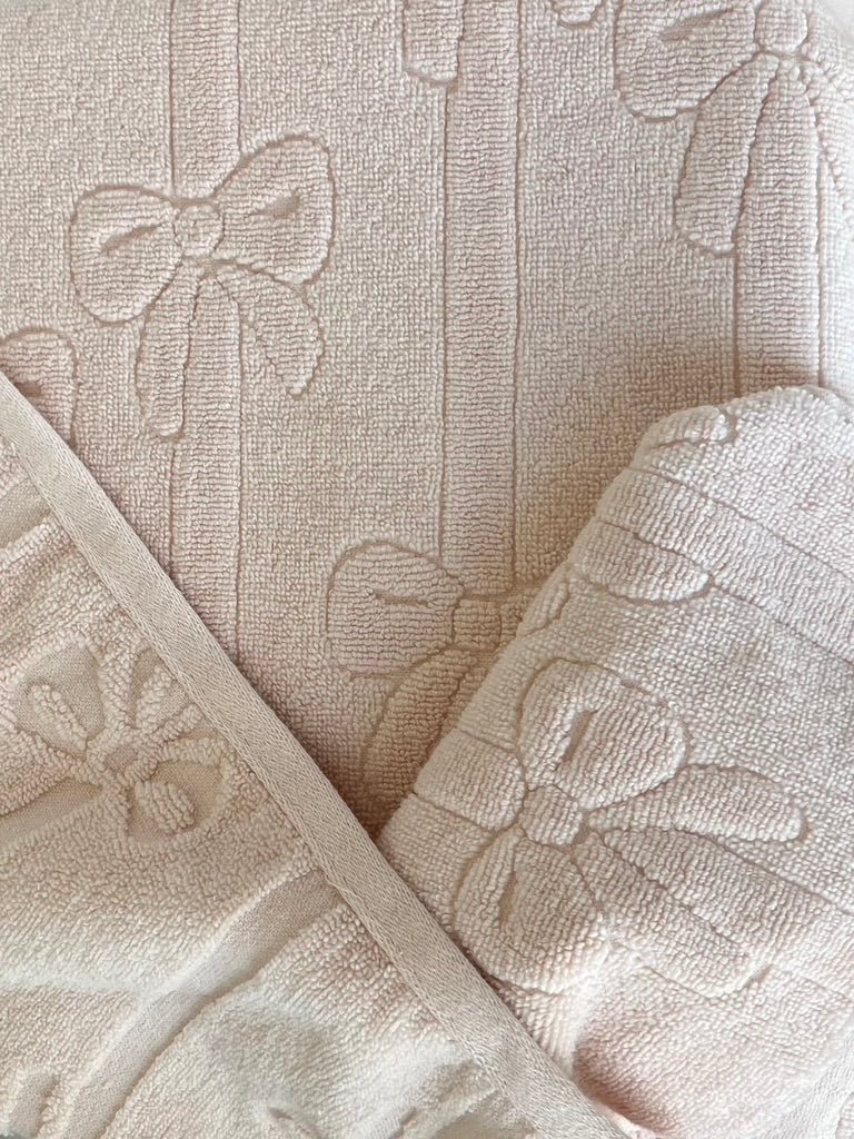 Peach Bows on a String hooded bath towel